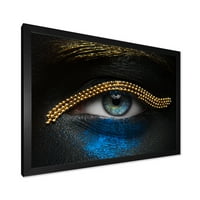 עיצוב אמנות 'עיני ילדה עם שרשרת זהב ופיגמנט כחול' הדפס אמנות ממוסגר מודרני